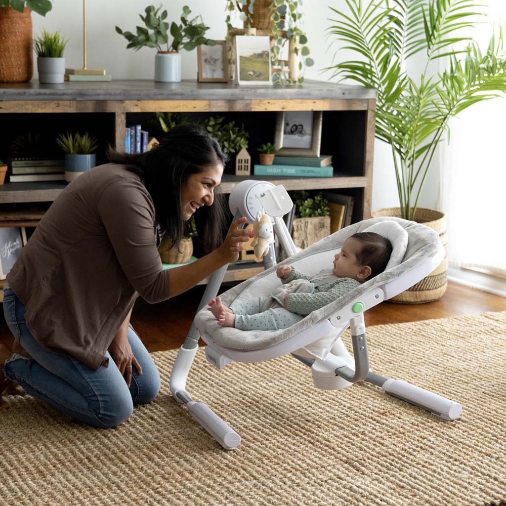 INGENUITY Rezgő hinta dallamokkal USB Dual-Direction AnyWay Sway™ Ray™ 0+, do 9 kg-ig