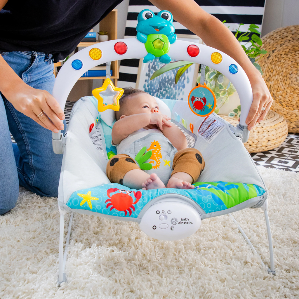 BABY EINSTEIN Zenei vibráló hintaszék fényekkel Kick to It Neptune 9 kg-ig