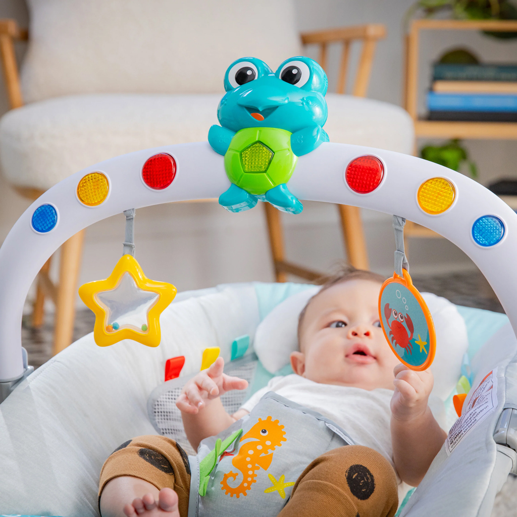 BABY EINSTEIN Zenei vibráló hintaszék fényekkel Kick to It Neptune 9 kg-ig