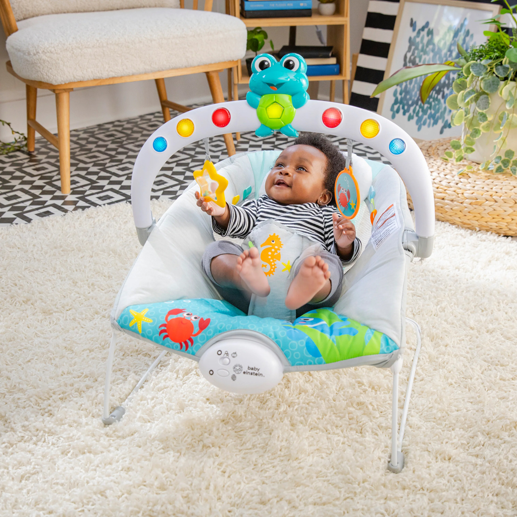 BABY EINSTEIN Zenei vibráló hintaszék fényekkel Kick to It Neptune 9 kg-ig
